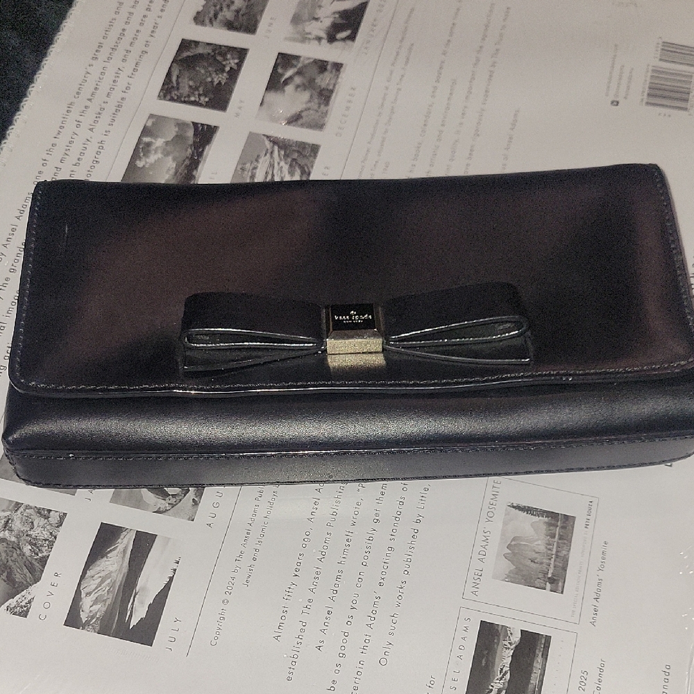 Kate Spade Elegant Black Clutch with Bow Accent